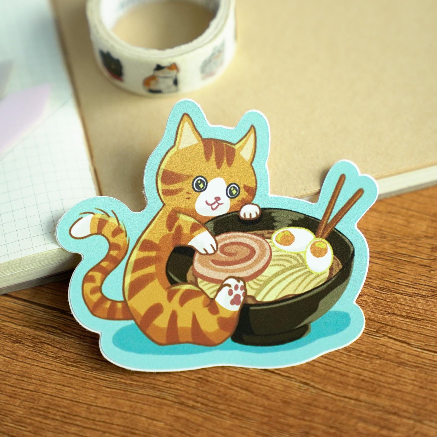 Cute Ramen Cat Sticker - Orange Tabby Kitty Hugging a Bowl of Noodles