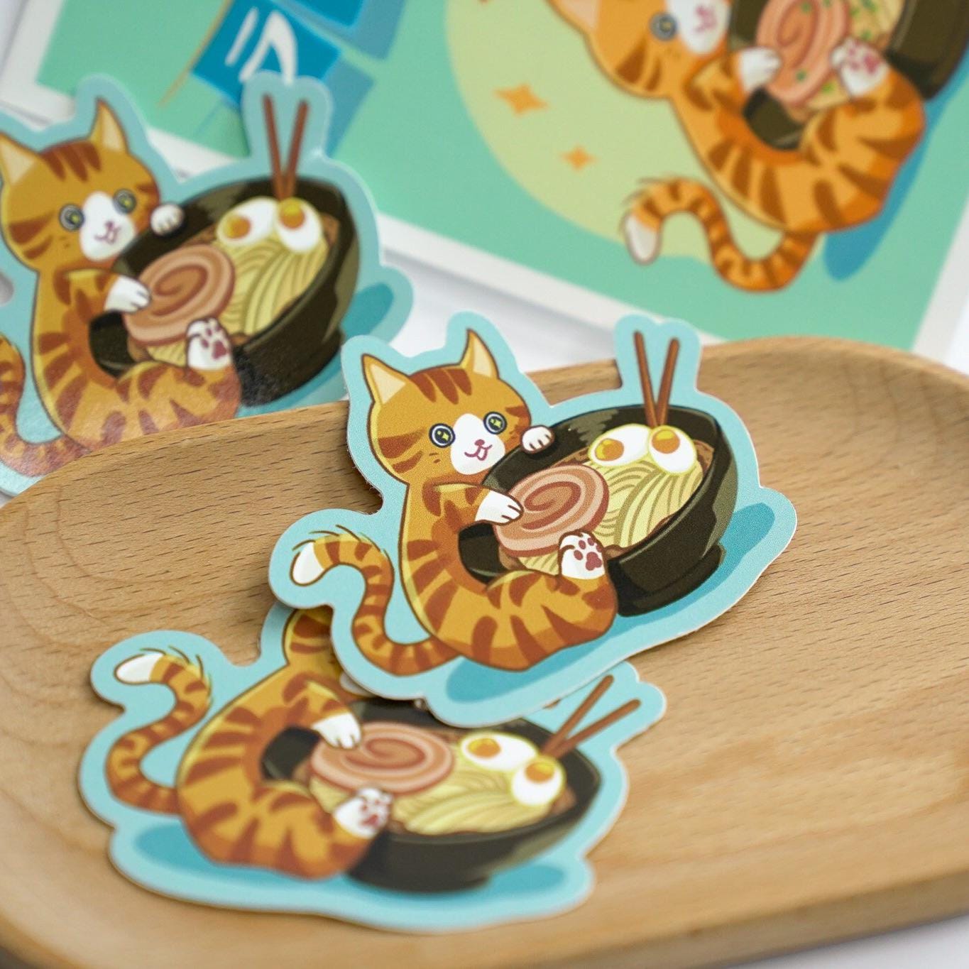 Cute Ramen Cat Sticker - Orange Tabby Kitty Hugging a Bowl of Noodles